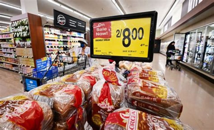 How do grocery stores redeem coupons?