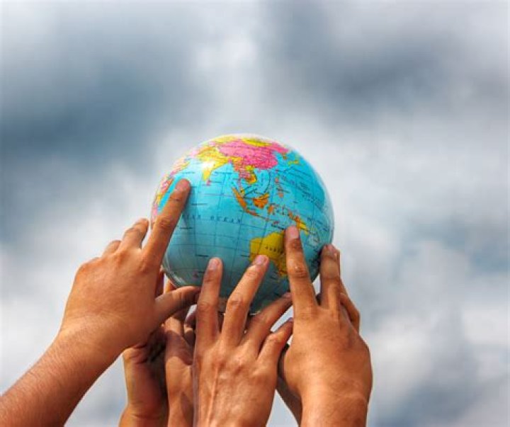 How does the global village impact culture?