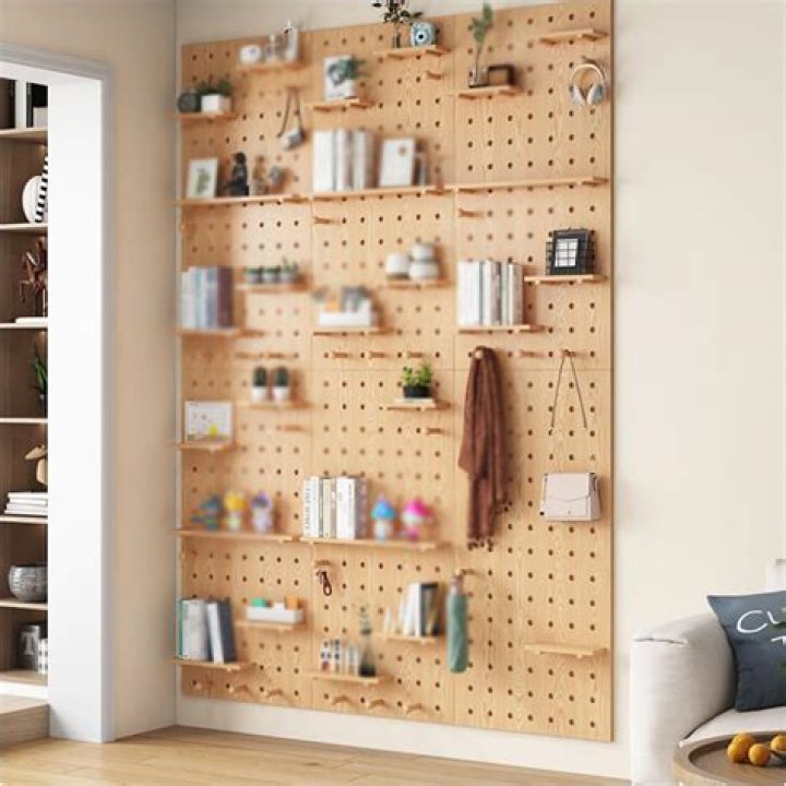 What is the pegboard bookkeeping system and what are the advantages to use the pegboard system?