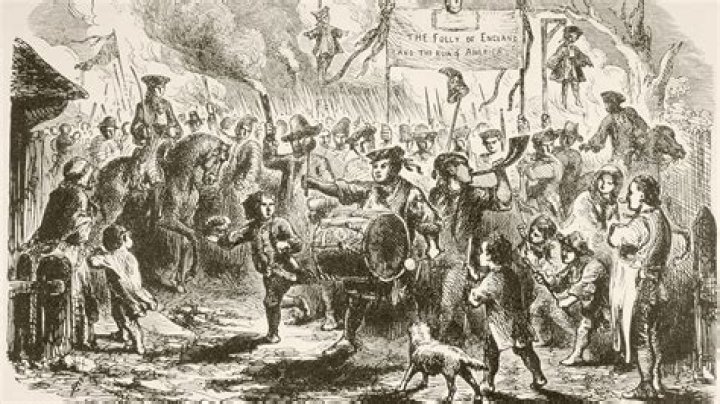 What were the colonists reaction to the Tea Act?